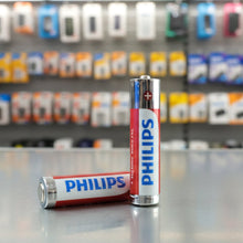 Two AA alkaline batteries from Genzy Store, compact and cylindrical, with silver and black design, suitable for various electronic devices.